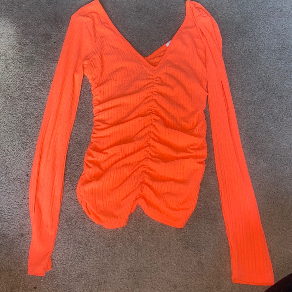 neon orange long sleeve shirt